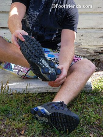 Stu shows off his sneakers and socks