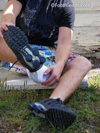 Stu shows off his sneakers and socks