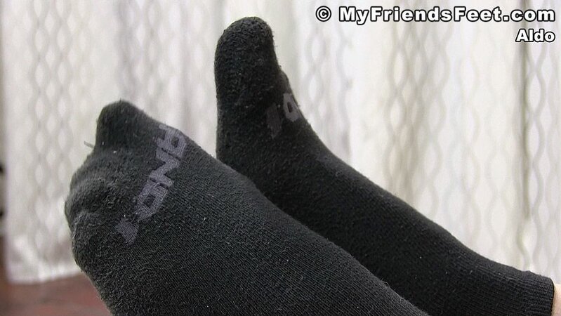 Aldo shows off his socks and sexy feet