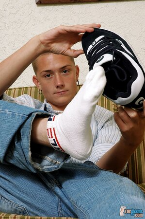 Seth Evans shows off his socks and feet