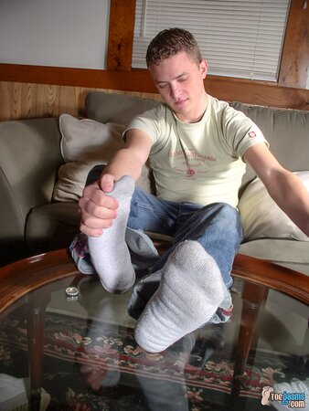 Justiny shows off his sneakers and socks