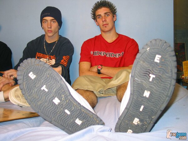 Ian Madrox, Kelly Cooper and Evan Heinze shows off their sneakers and socks