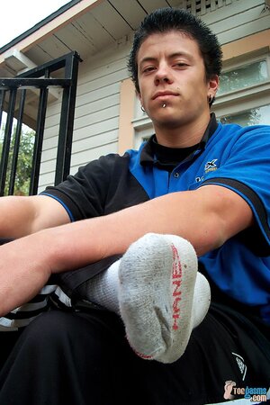 Jordan Kane shows off his sneakers and socks