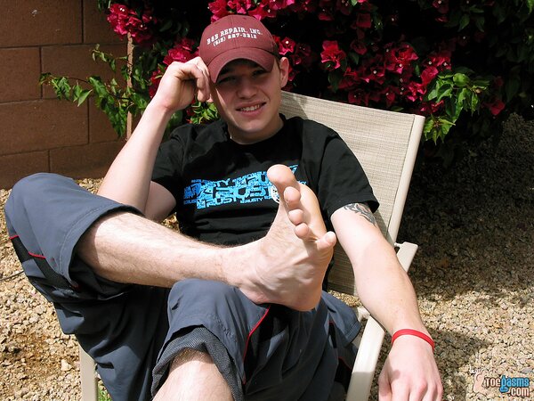 Jeremiah Johnson shows off his socks and feet