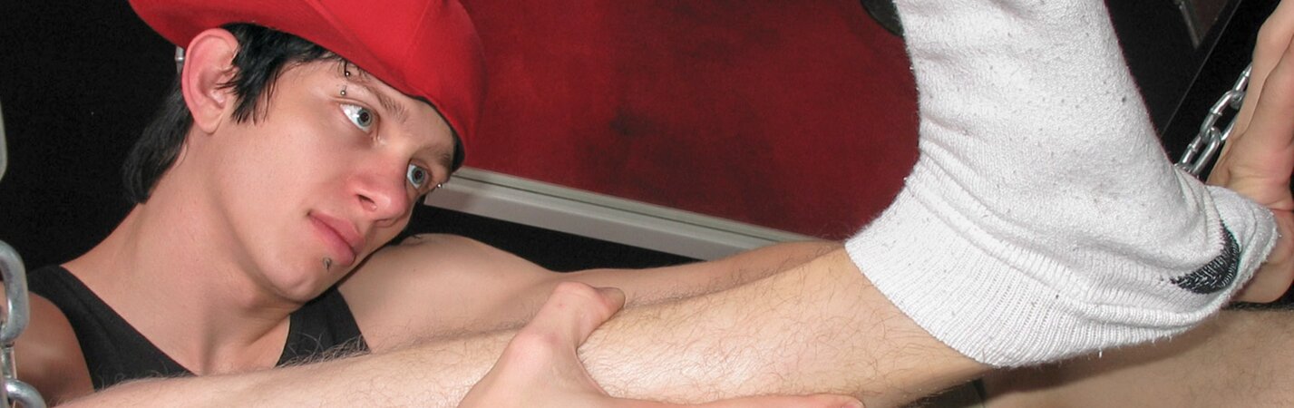 Ian Madrox shows off his socks and feet