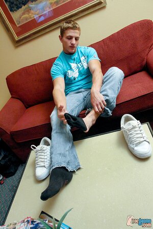 Marcus Mojo shows off his sneakers and socks