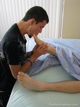 Cody Trembles foot worshiped by Adam Star