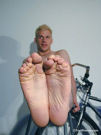 Rusty Rodes shows off his feet and body