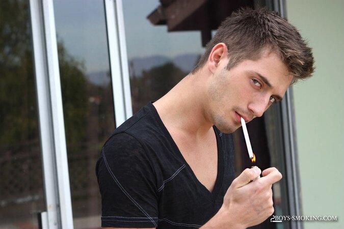 JD Phoenix Smoking Outdoors