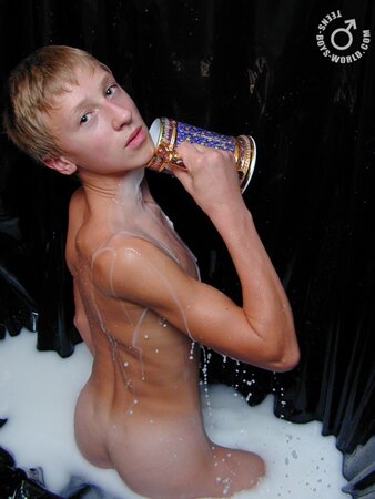 Ivan teases while pouring milk on his bare body