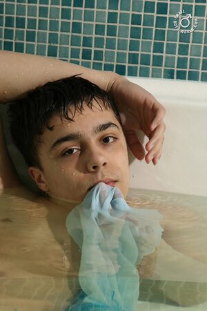 Greg enjoys bath time alone with himself