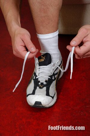 Henry teases with his sneakers and sweaty foot