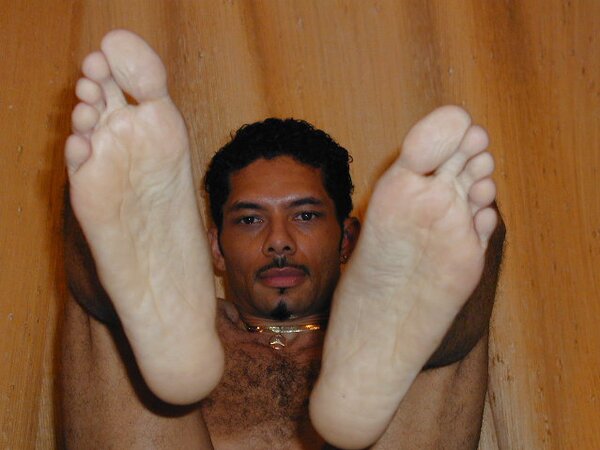 Berto shows off his flawless toes at the beach party