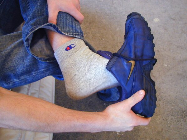 David teases with his smelly sport socks and playful feet