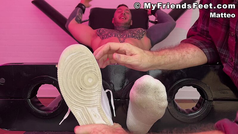 Muscle man Matteo enjoys foot tickling after removing his socks