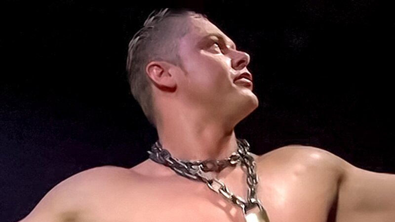 Rex Knight struggles in chains and shows off his massive muscles