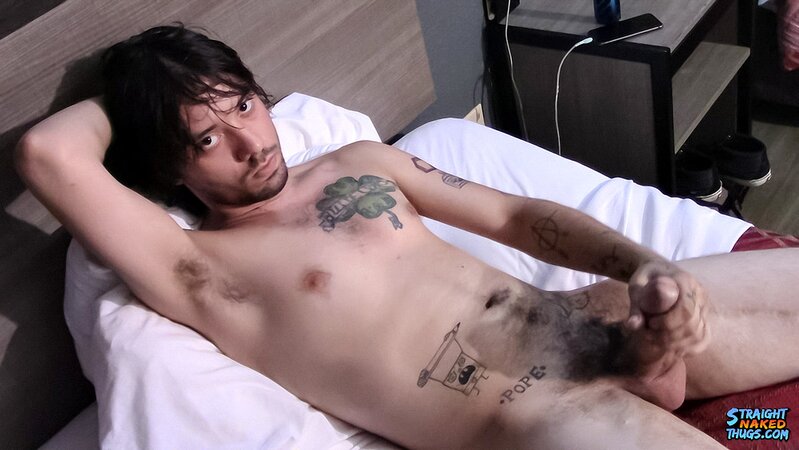 Tattooed twink Chad Turner shows off his bare feet while jacking off