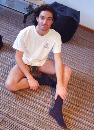 Bjorn from Sweden shows off his dark socks and sexy size 13 feet