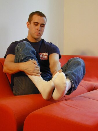 Garad shows off his sexy socked feet