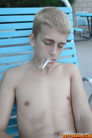 Kayden Daniels smokes by the pool and strokes his thick cock