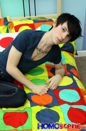 Emo twink strips and and shows tattoos on camera