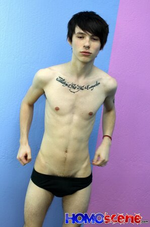 Emo twink strips and and shows tattoos on camera