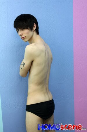 Emo twink strips and and shows tattoos on camera