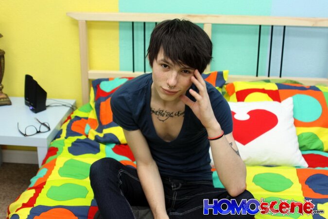 Emo twink strips and and shows tattoos on camera