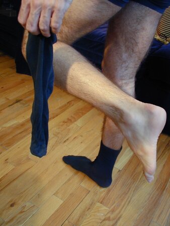 Muscle stud Cole enjoys the intoxicating scent of Kent's worn socks