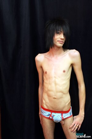 Emo hairdresser Brandon White teases the camera with his slim body