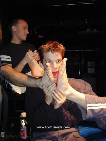 Twink Brandon models his feet but ends up getting them tickled instead