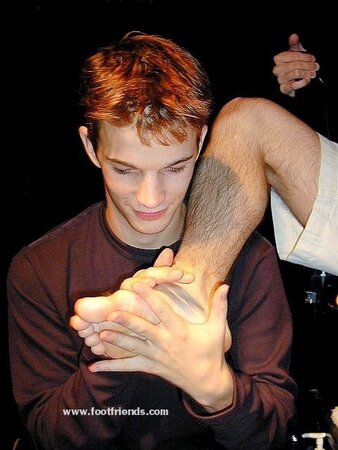 Twink Brandon models his feet but ends up getting them tickled instead