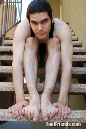 Joseph teases with his size 11 feet and hairy legs