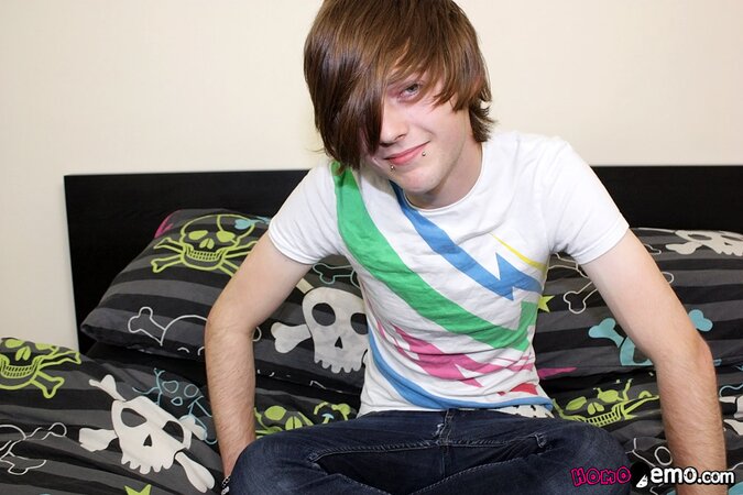 Cute emo boy Tyler Archers shows off his long hair and piercings while masturbating