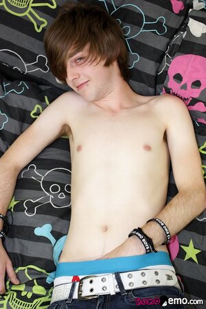 Cute emo boy Tyler Archers shows off his long hair and piercings while masturbating