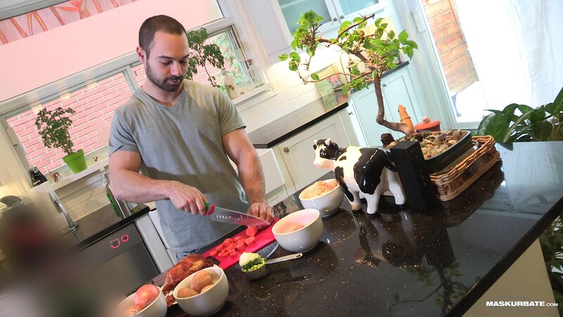 Alexandre strokes his cock while cooking