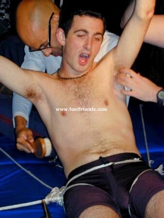 Ken tickles Alex in stocks and makes him laugh