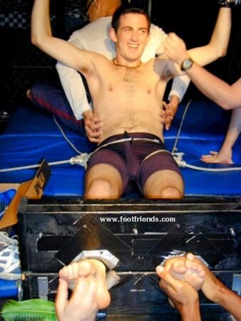 Ken tickles Alex in stocks and makes him laugh