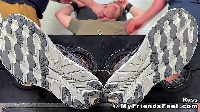 Dev tickles Rus feet with feathers to get revenge