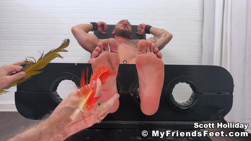 Thom tickles Scott Holliday in chair with Dan Edwards