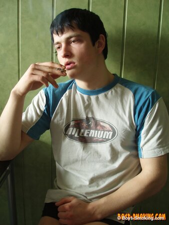 Gus Kitchen strokes his cock while smoking and cums fast
