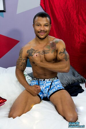 Chris rubs his cock and cums while watching porn on his phone
