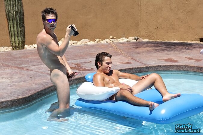 Zack Randall gets his uncut cock stroked by Jizzy McBone in the sun