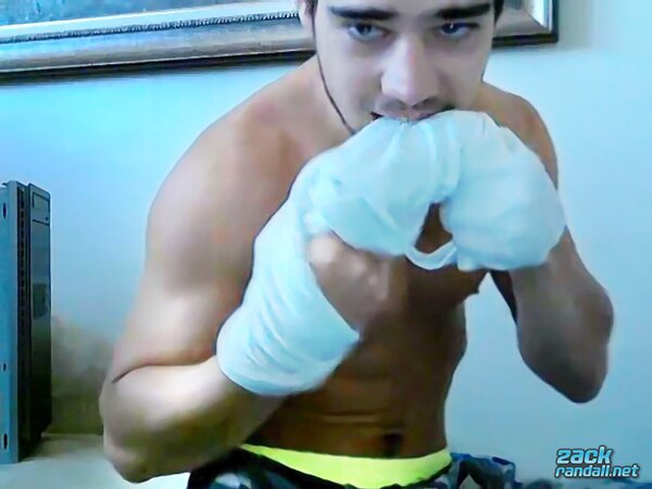 Zack Randall strokes his uncut cock hard until he sprays a big load