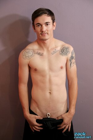 Lucas Daniels shows off his tattoos while jerking off and cumming