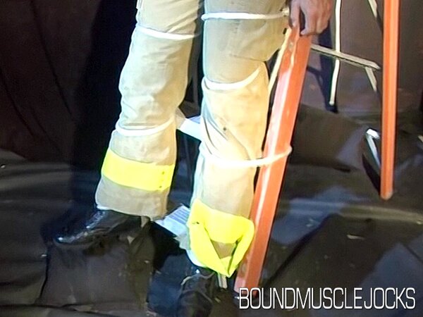 Duke Rivers is gagged and bound, showing off his big body