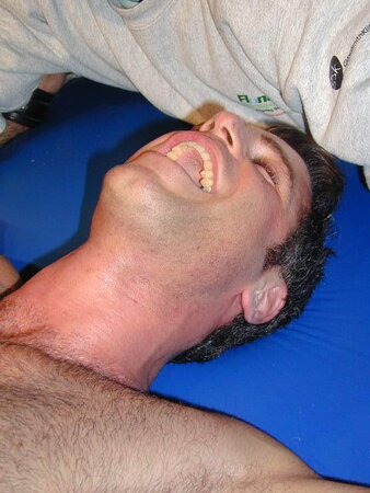 Jessie laughs at Dan’s ticklish feet before both get locked in stocks