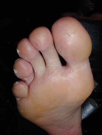 Jessie laughs at Dan’s ticklish feet before both get locked in stocks