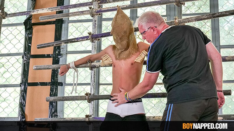 Ricky Vilela is blindfolded, tied up, and teased by Master Sebastian Kane