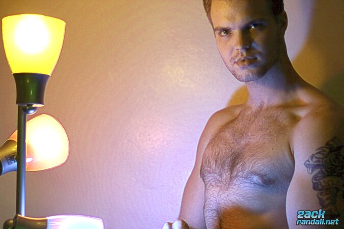 Billy Club teases with sexy poses and soft lighting in a hot gym shoot